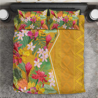 Yellow tropical floral bedding set with two matching pillowcases and duvet cover