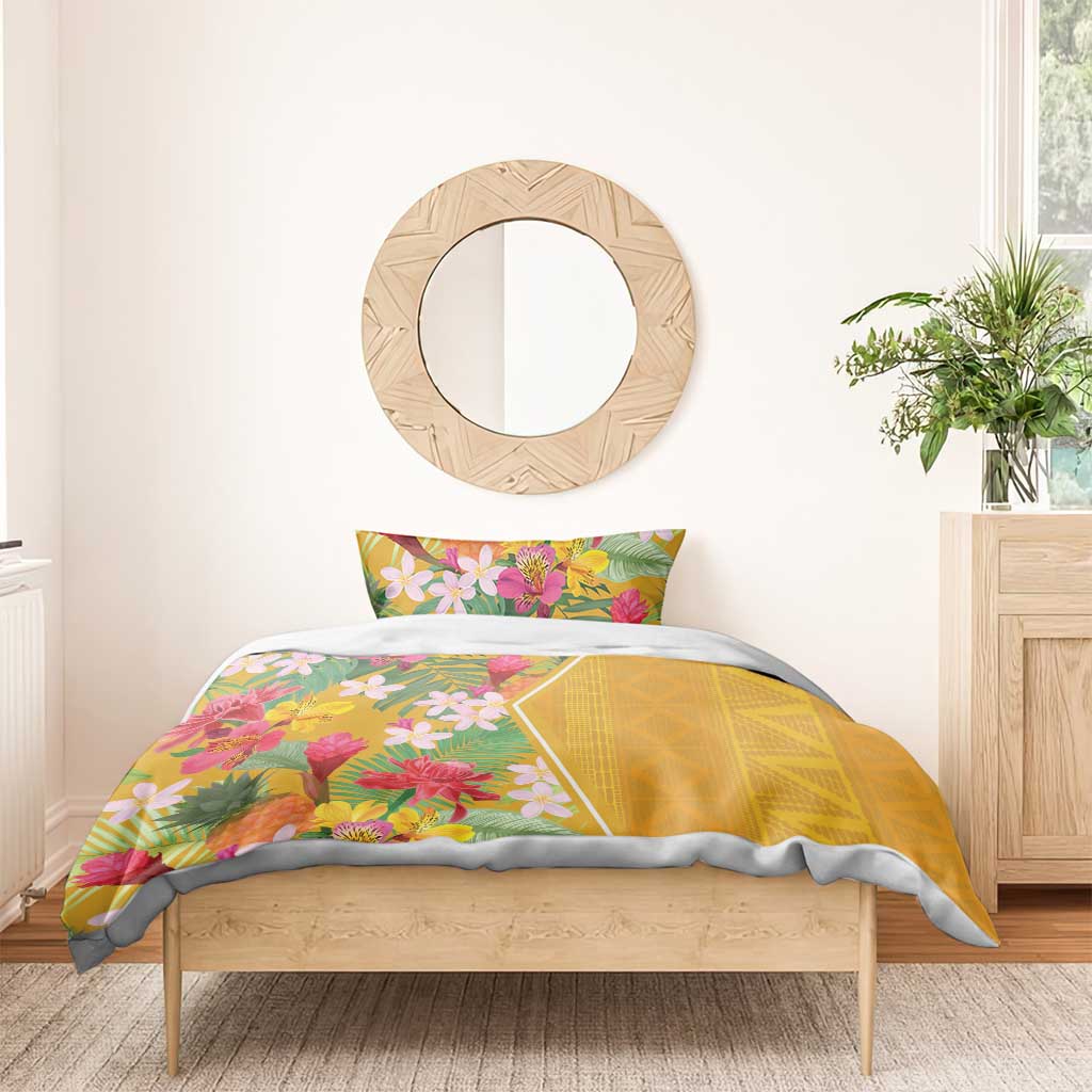 Yellow tropical floral bedding set on bed with two pillowcases and duvet cover print