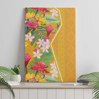 Tropical floral canvas wall art on yellow background with pink flowers and green palm leaves
