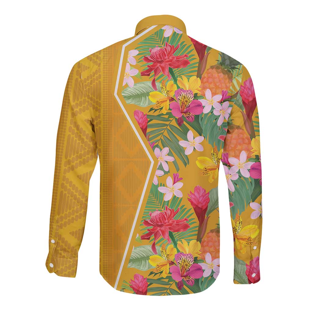 Yellow long-sleeve button shirt with tropical flowers and leaves, partial view of pattern