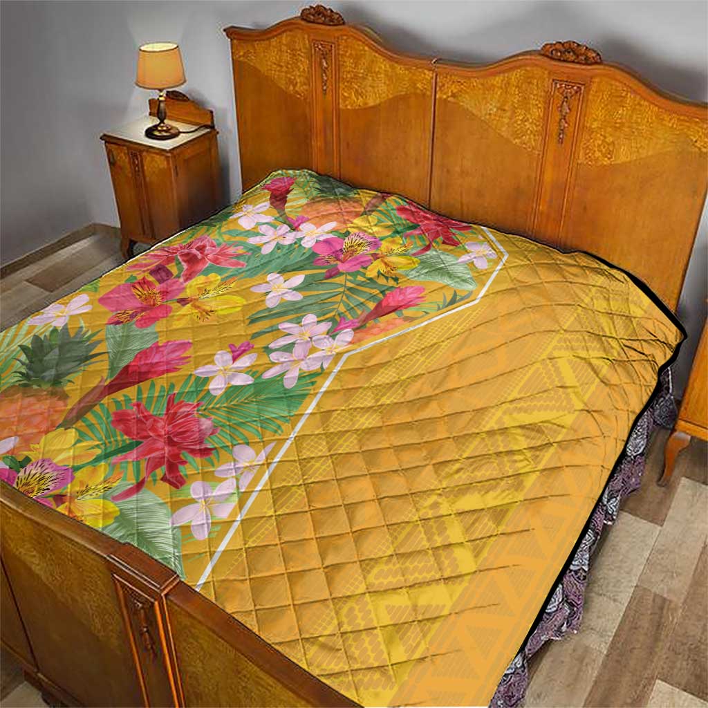 Yellow floral quilt with diamond stitching, tropical flower print on top, dark border edge