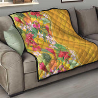 Yellow tropical floral quilt with diamond quilting, colorful flower pattern and dark trim