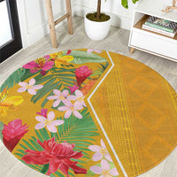 Yellow round carpet with tropical flowers and green leaves, geometric border pattern