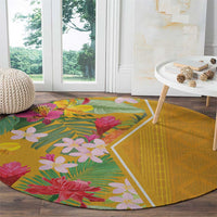 Yellow round carpet with tropical flower cluster print, green leaf panel and chevron border