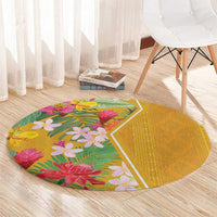 Yellow round carpet with tropical flowers and green leaves, geometric corner border