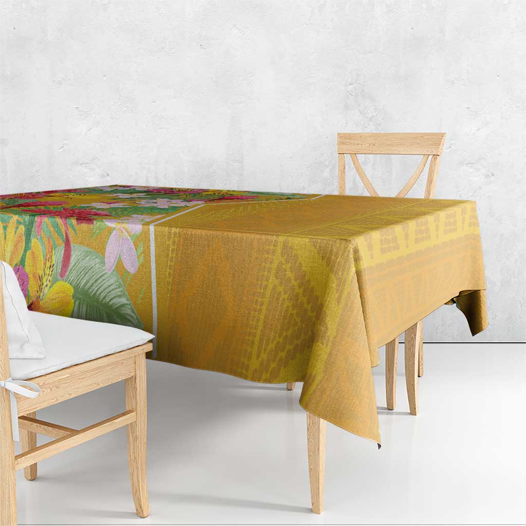 Yellow tablecloth with tropical floral print and geometric pattern drape on table