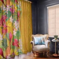 Tropical floral and mustard yellow window curtains hanging side by side