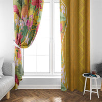 Window curtains framing a door: tropical floral left panel and solid mustard yellow right