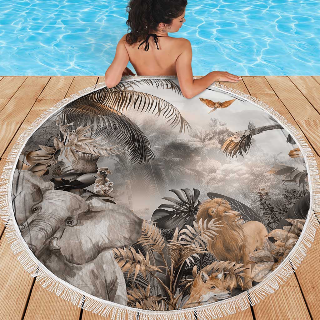 Round grey safari animal beach blanket laid on wood deck, fringed edge