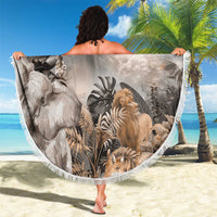 Round grey safari animal beach blanket held up, fringed edge and animal print