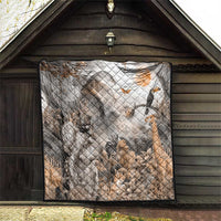 Grey safari animal quilt hanging indoors, quilted diamond pattern with lion and birds