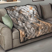 Grey safari animal quilt on a sofa, quilted diamonds with lion and giraffe motifs