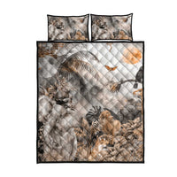 Grey quilt bed set with safari animals, feathers and foliage; includes 2 matching pillow covers.