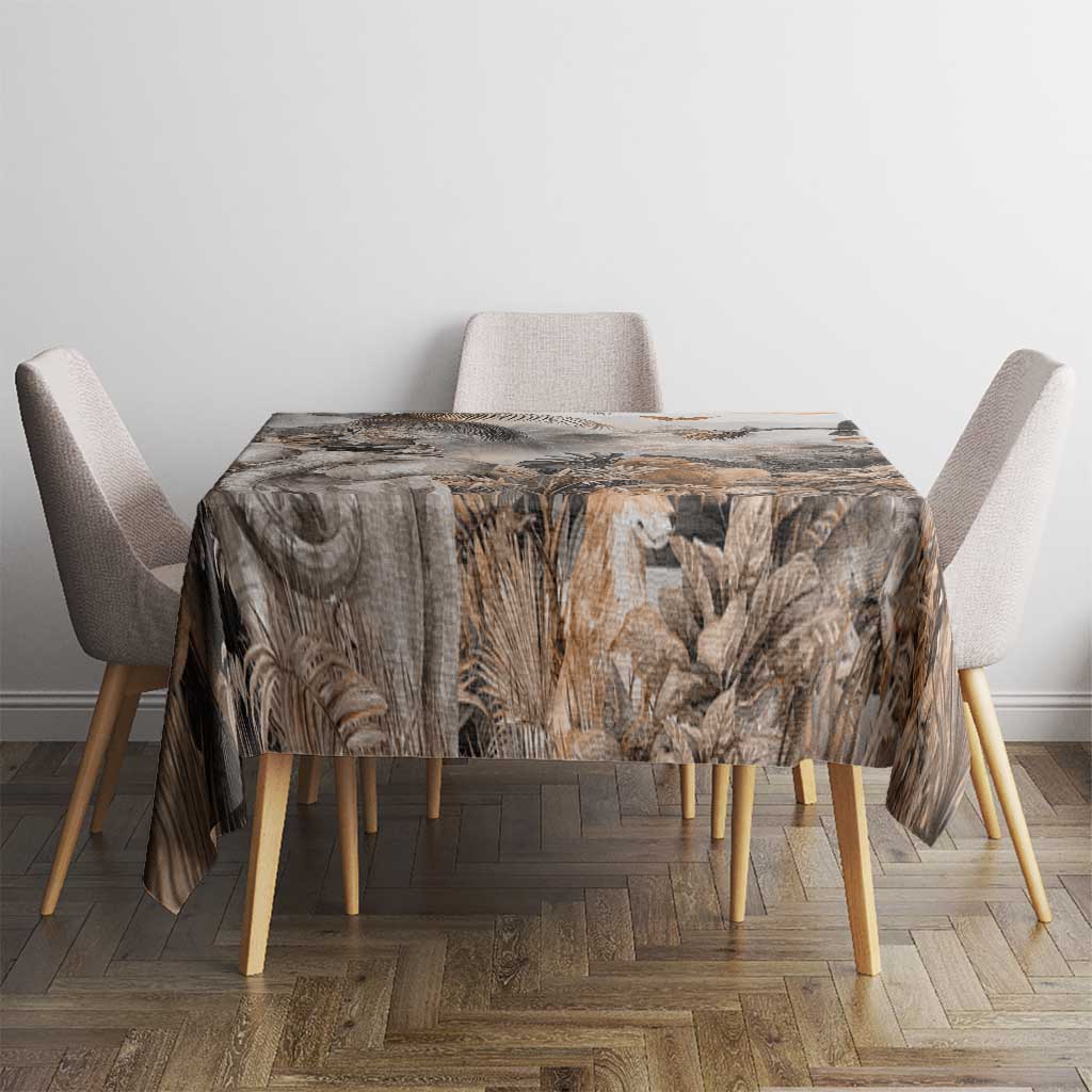 Grey safari animal tablecloth on table with leaf-and-wildlife pattern