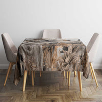 Grey safari animal tablecloth on table with leaf-and-wildlife pattern