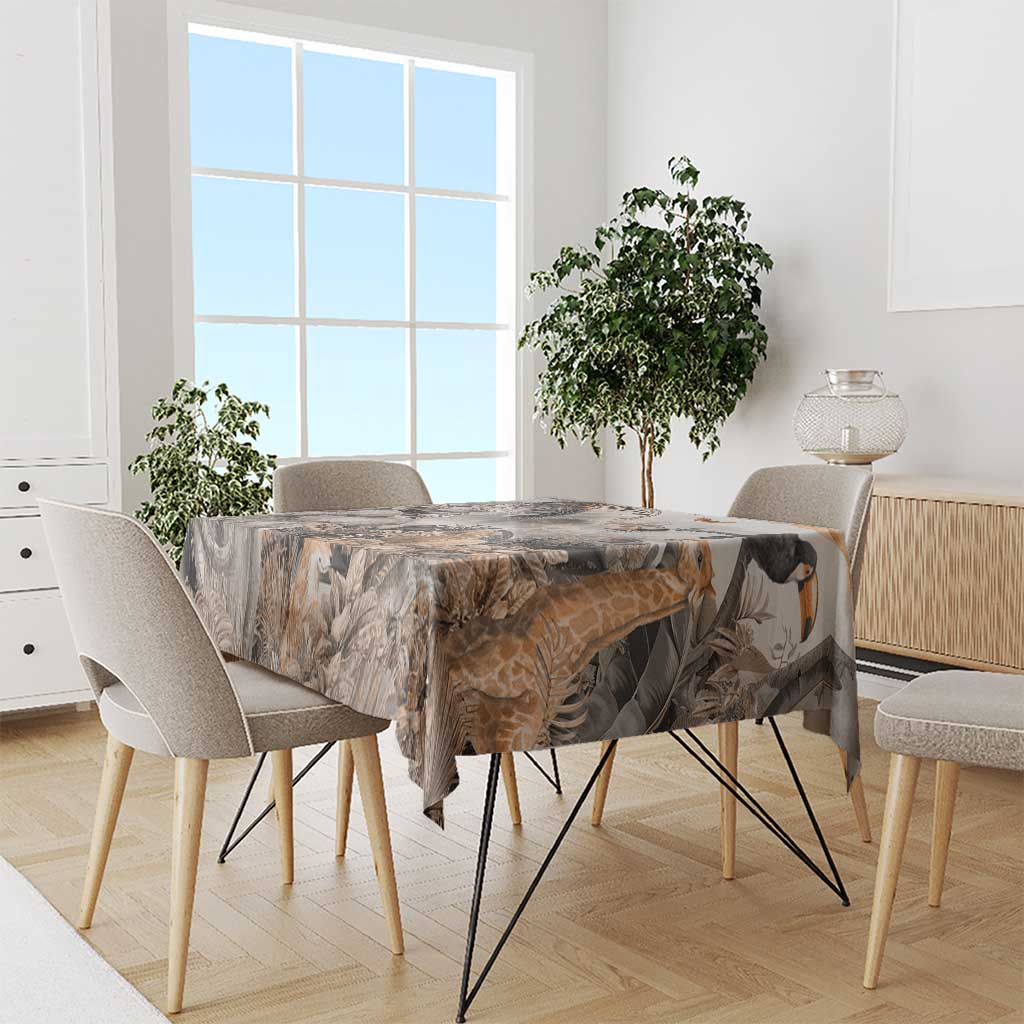 Grey safari animal tablecloth on dining table with birds and animal silhouettes