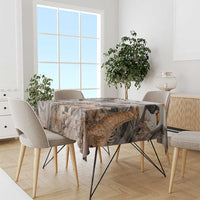 Grey safari animal tablecloth on dining table with birds and animal silhouettes