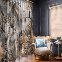 Grey safari animal printed curtain panel with elephants, toucans, and leaves, hanging beside window