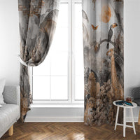 Grey safari animal printed curtains framing a window, with giraffe, elephant, and leaf details