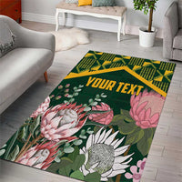 Rectangular green personalized area rug with kente strip pattern, protea flowers, 'Your Text'