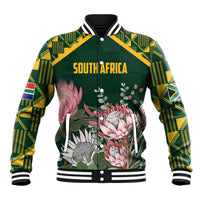 Green baseball jacket with kente-pattern sleeves, floral print, 'SOUTH AFRICA' on front