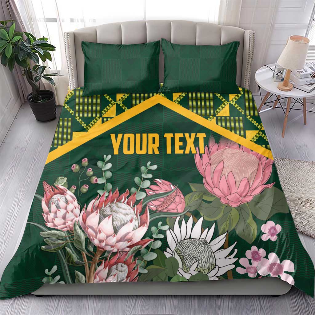 Green personalized duvet cover set with pillow shams, yellow kente pattern and pink protea florals, 'YOUR TEXT'