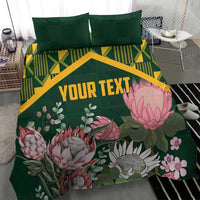 Green personalized duvet cover set with yellow kente chevron pattern and pink protea florals, 'YOUR TEXT'