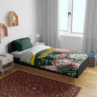 Green personalized duvet cover set with yellow kente pattern and pink protea florals, 'YOUR TEXT'