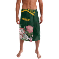 Green lavalava sarong skirt with kente top band, floral panel, and "YOUR TEXT"