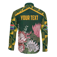 Green long sleeve button shirt, kente-style sleeves, floral back with "YOUR TEXT"