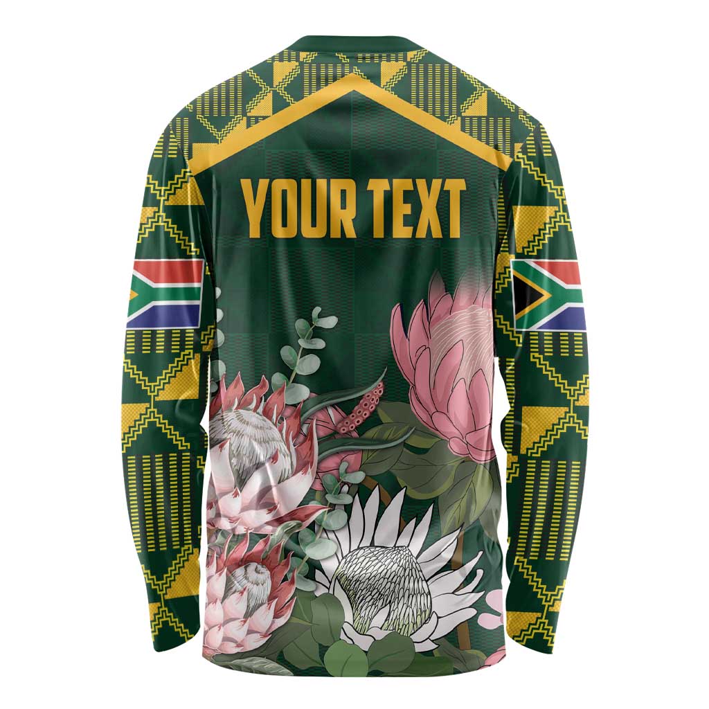 Green long-sleeve shirt with kente sleeve panels and 'YOUR TEXT' front print