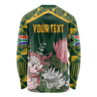 Green long-sleeve shirt with kente sleeve panels and 'YOUR TEXT' front print