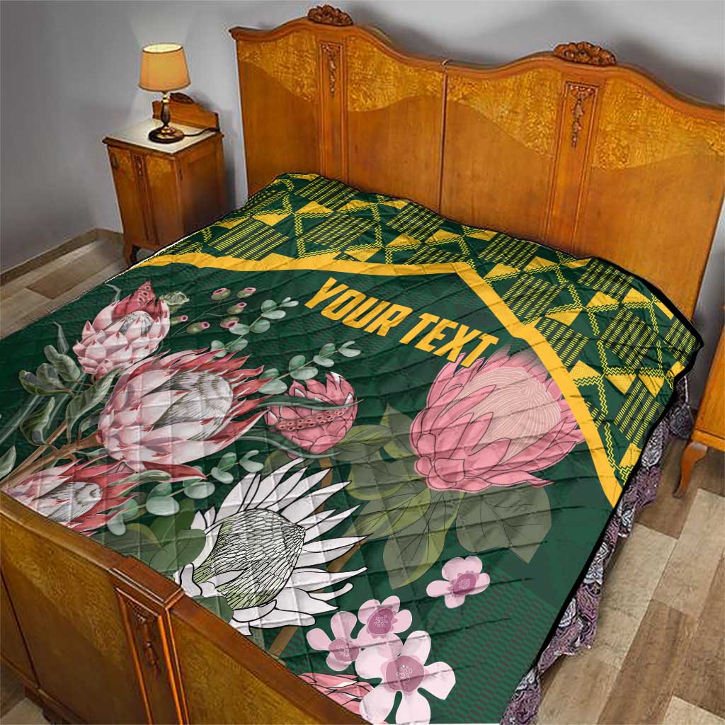 Green floral quilt with yellow kente stripe, protea bouquets, and “YOUR TEXT”
