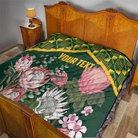 Green floral quilt with yellow kente stripe, protea bouquets, and “YOUR TEXT”