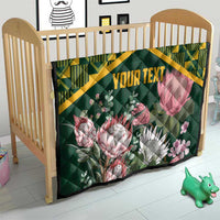 Green quilt with yellow kente border and protea floral print labeled “YOUR TEXT”