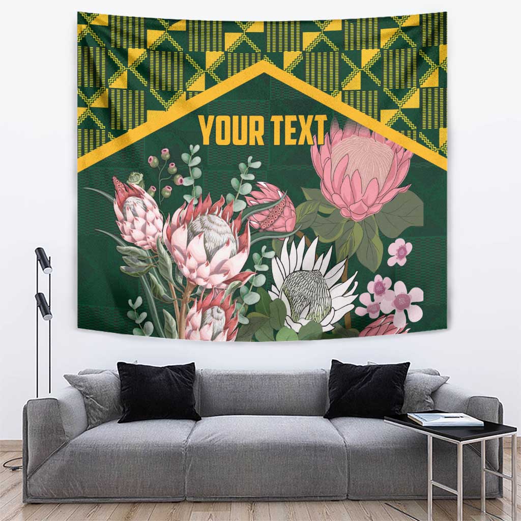 Green protea floral wall tapestry with kente-style geometric border and centered text area