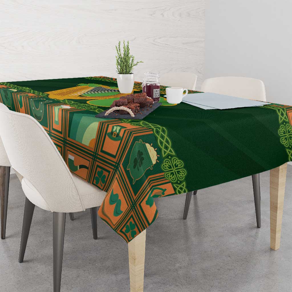 Green Irish tablecloth with harp and shamrock motifs, corner drape detail