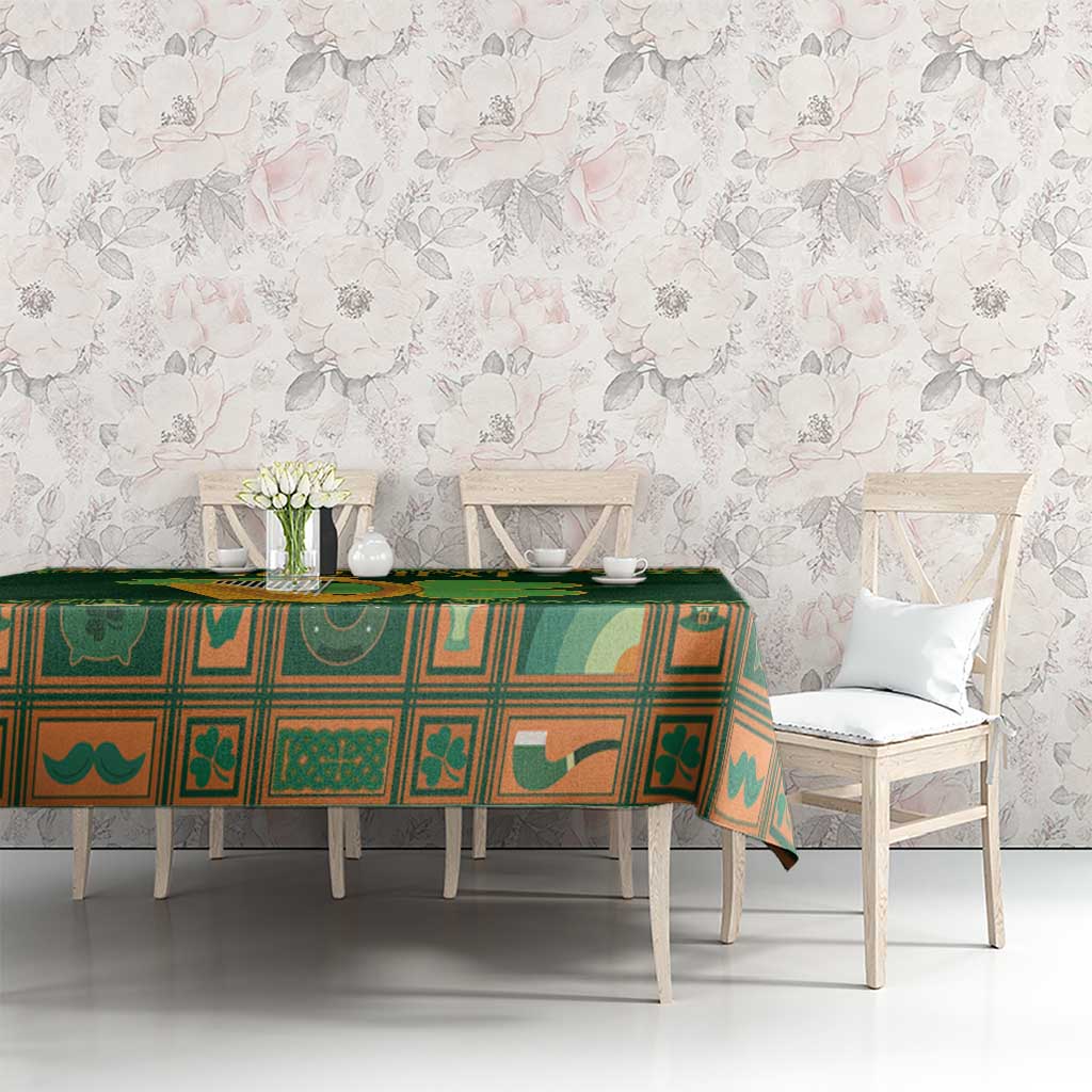 Green Irish tablecloth with harp and shamrock motifs on long dining table