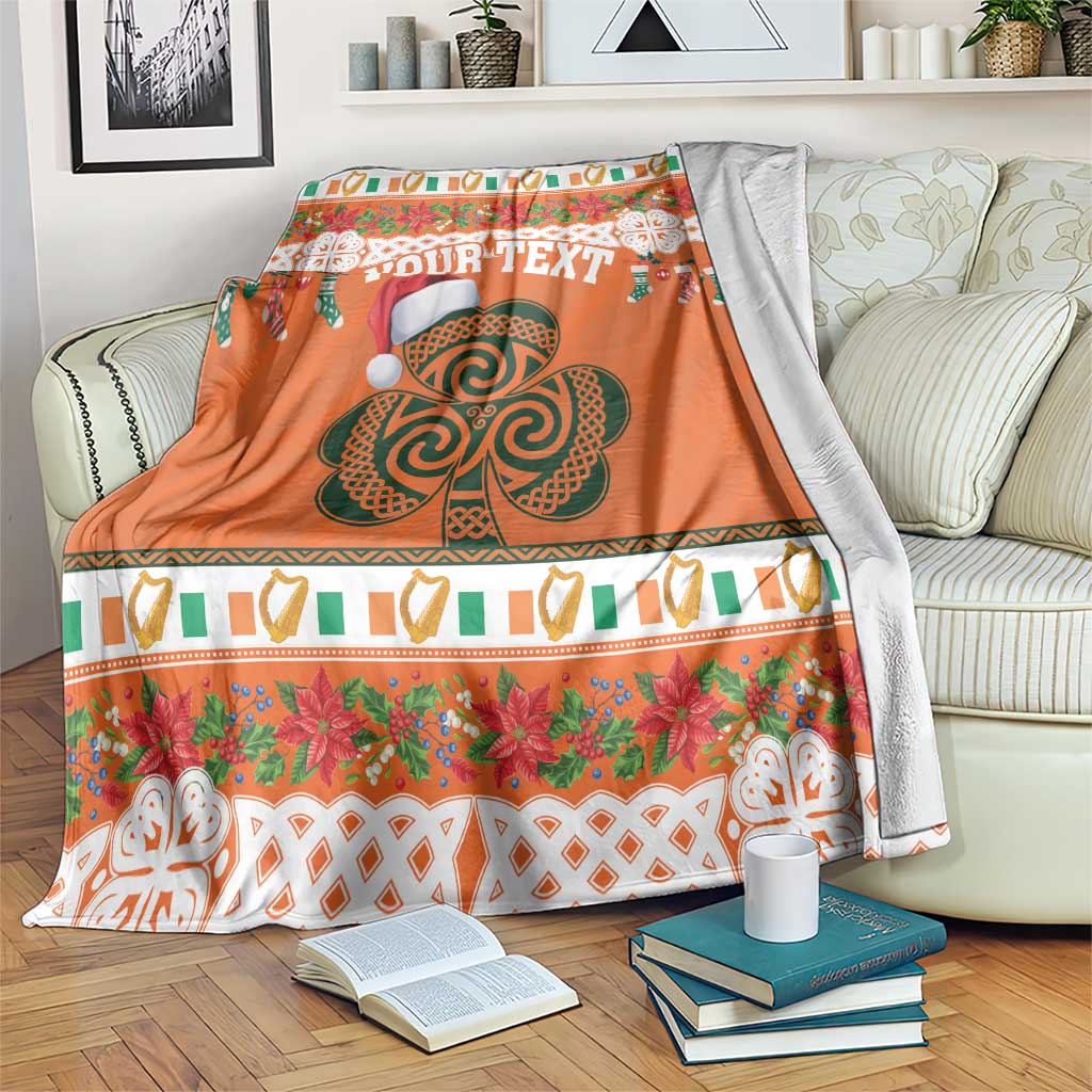 Personalized orange Christmas blanket with large Celtic shamrock and “YOUR TEXT” design