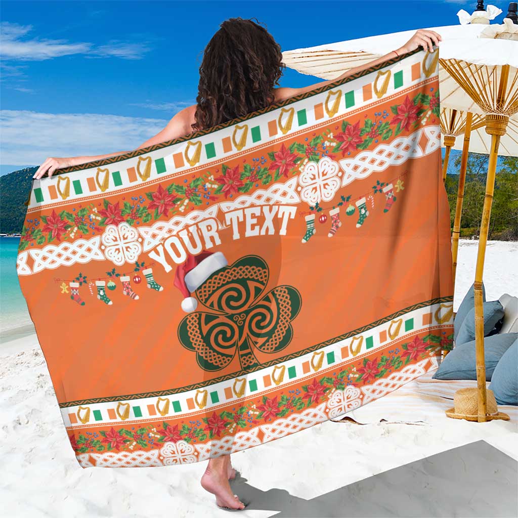 Orange personalized sarong with celtic shamrock pattern and customizable text panel