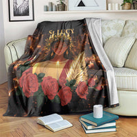 Black St. Lucy devotional blanket with a glowing saint portrait, roses, and candles