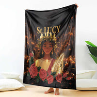 Black St. Lucy blanket featuring saint portrait, roses, lit candles, and gold wheat