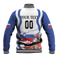 Unisex baseball jacket with white back, blue sleeves, striped ribbed collar, number and floral graphic