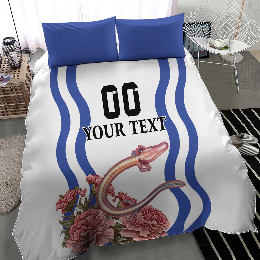 White bedding set with blue wavy border stripes, black “00” and “YOUR TEXT”, pink blooms