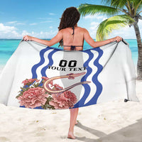White sarong laid out, blue wave border, dragon and pink carnation flowers, 'YOUR TEXT'