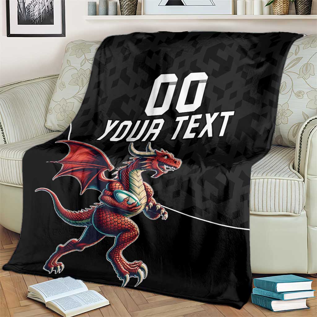 Black rugby blanket spread out with red dragon mascot and 'YOUR TEXT' text