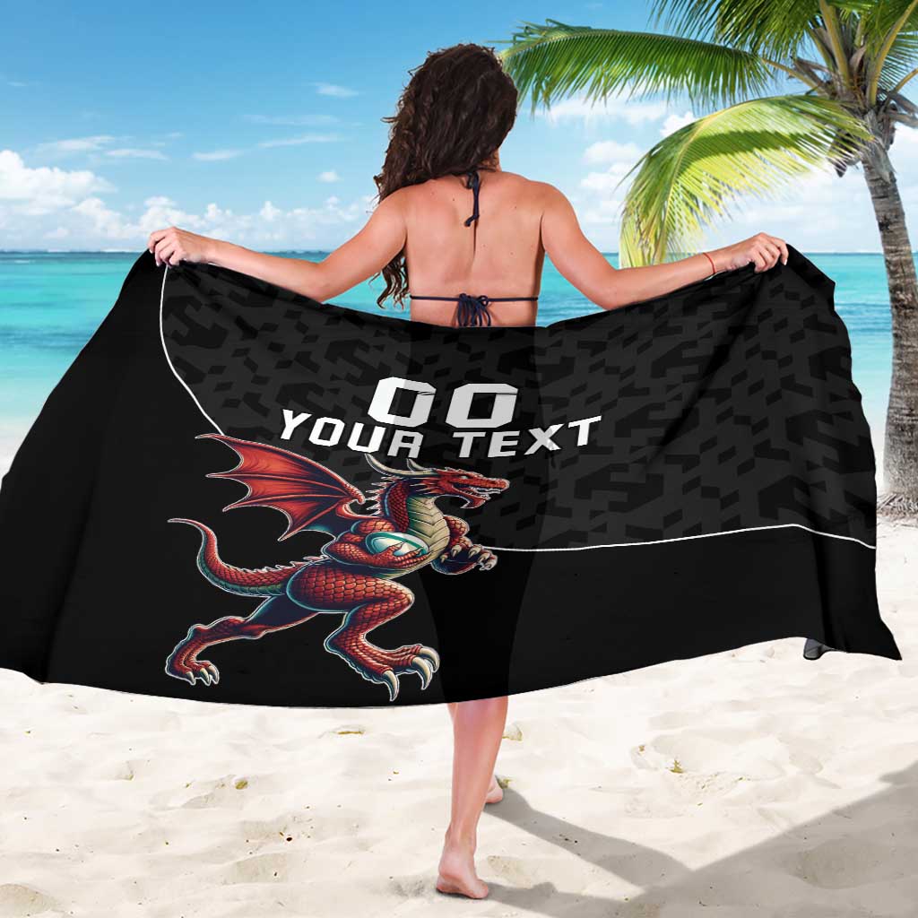 Black rugby sarong on model, dragon mascot and 'YOUR TEXT' print on back