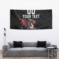 Black tapestry with dragon mascot graphic and YOUR TEXT, hanging display view