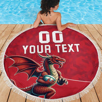 Red round beach blanket with white fringe featuring dragon mascot and '00 YOUR TEXT' center