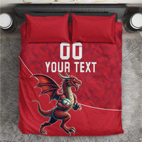 Red rugby bedding set with dragon mascot and large "DO YOUR TEXT" print, two pillows